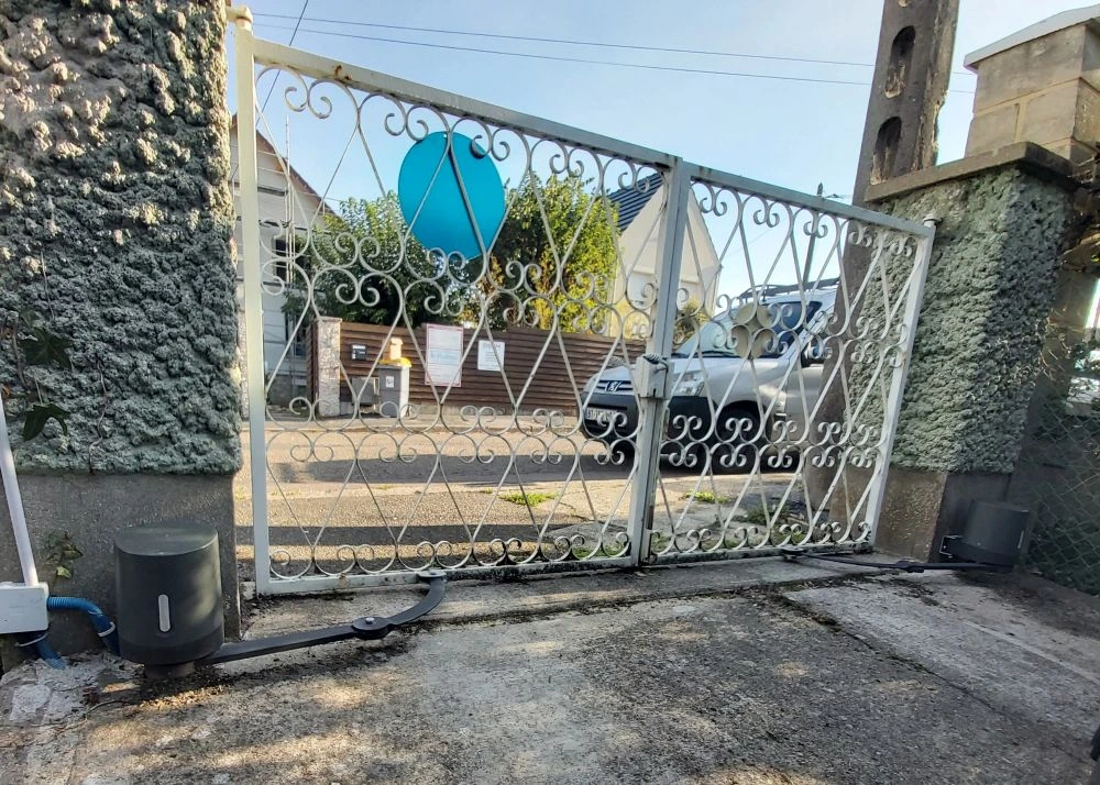 Adaptation d'une motorisation sur un ancien portail