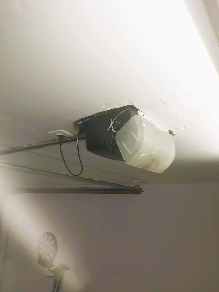 Porte motorisée mise en place moteur